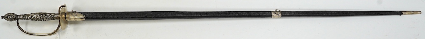 A late 18th century court sword with white metal grip, knuckle guard and mounts, decoration to scabbard band believe to be based on Admiral Duncan’s crest (Camperdown 1797), blade 84cm. Condition - fair to good, some wea